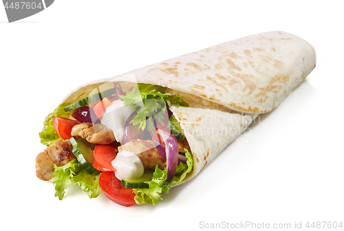 Image of Tortilla wrap with fried chicken meat and vegetables