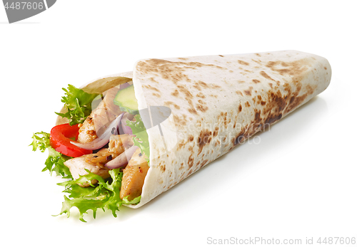 Image of Tortilla wrap with fried chicken meat and vegetables