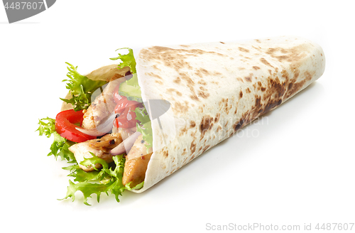 Image of Tortilla wrap with fried chicken meat and vegetables