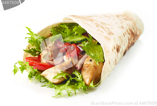 Image of Tortilla wrap with fried chicken meat and vegetables