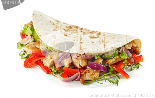 Image of Tortilla wrap with fried chicken meat and vegetables