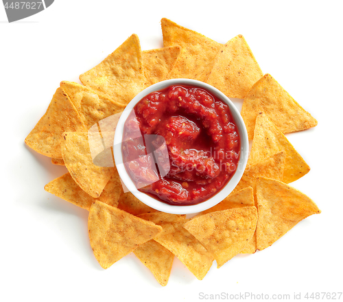 Image of corn chips nachos and salsa sauce