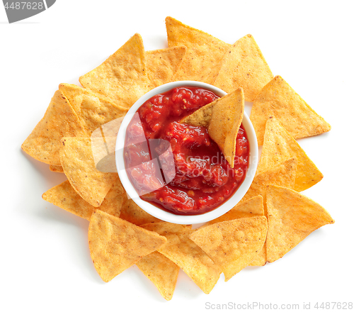 Image of corn chips nachos and salsa sauce