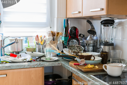 Image of Compulsive Hoarding Syndrom - messy kitchen