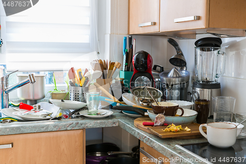 Image of Compulsive Hoarding Syndrom - messy kitchen