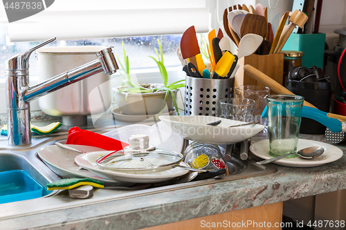 Image of Compulsive Hoarding Syndrom - messy kitchen