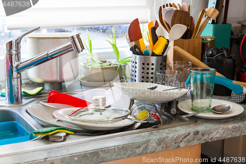 Image of Compulsive Hoarding Syndrom - messy kitchen