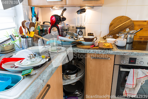 Image of Compulsive Hoarding Syndrom - messy kitchen