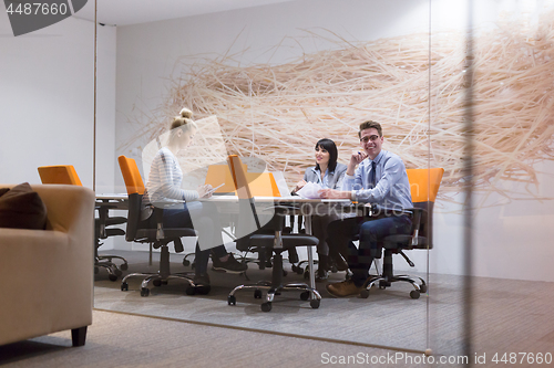 Image of Business Team At A Meeting at modern office building