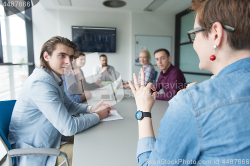 Image of Business Team At A Meeting at modern office building