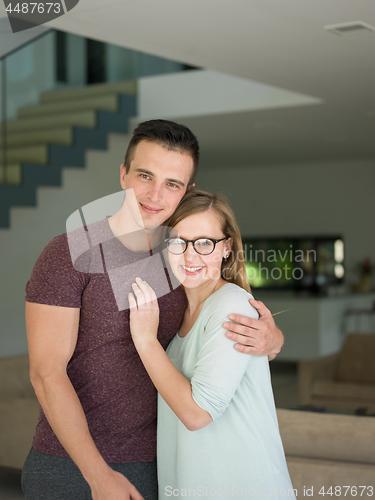 Image of couple hugging in their new home