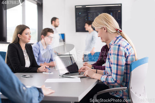 Image of Business Team At A Meeting at modern office building