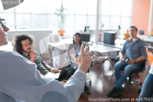 Image of Young Business Team At A Meeting at modern office building