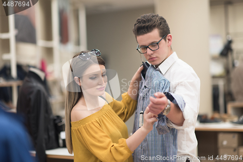 Image of couple in  Clothing Store