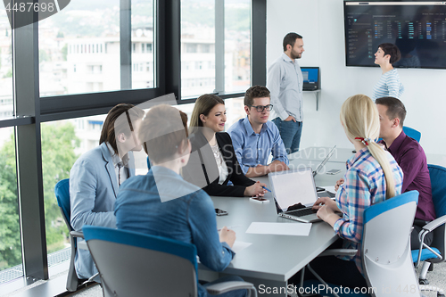 Image of Business Team At A Meeting at modern office building