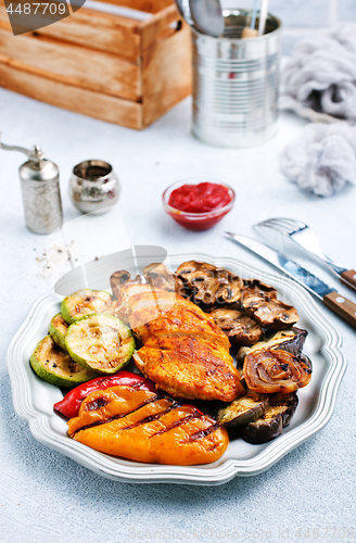 Image of chicken barbecue and grilled vegetables