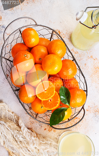 Image of tangerines and tangerine juice