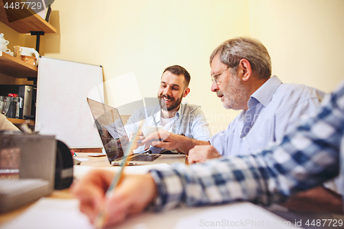 Image of Team job. Photo young businessmans working with new project in office