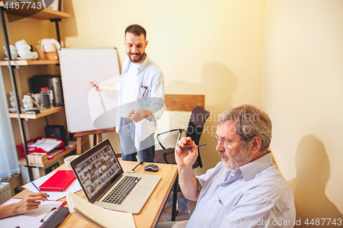 Image of Team job. Photo young businessmans working with new project in office