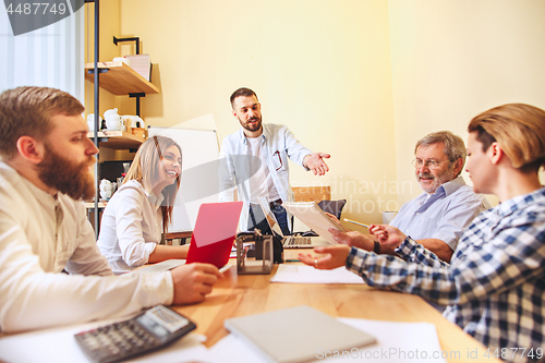Image of Team job. Photo young businessmans working with new project in office