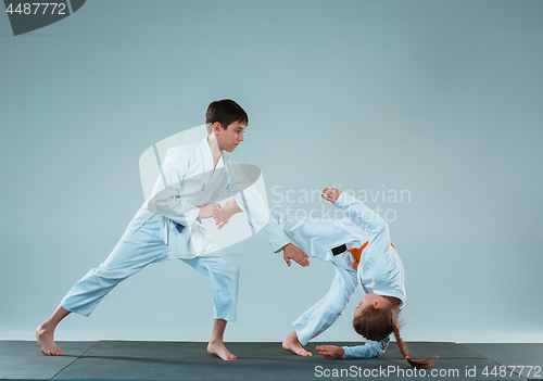 Image of The boy fighting at Aikido training in martial arts school. Healthy lifestyle and sports concept