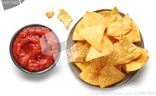 Image of corn chips nachos and salsa sauce