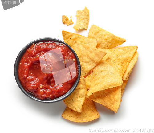 Image of corn chips nachos and salsa sauce