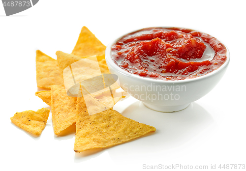 Image of corn chips nachos and salsa sauce