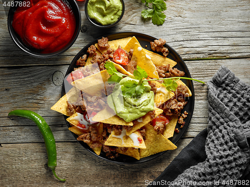 Image of corn chips nachos with fried minced meat