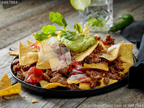 Image of corn chips nachos with fried minced meat