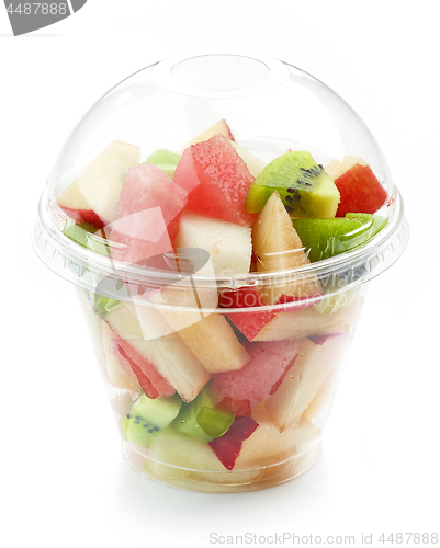 Image of fresh fruit pieces salad in plastic cup