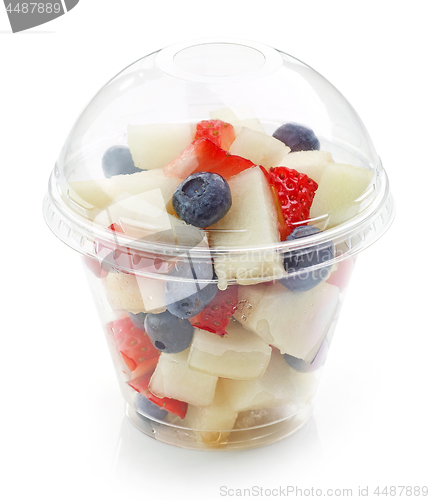 Image of fresh fruit pieces salad in plastic cup