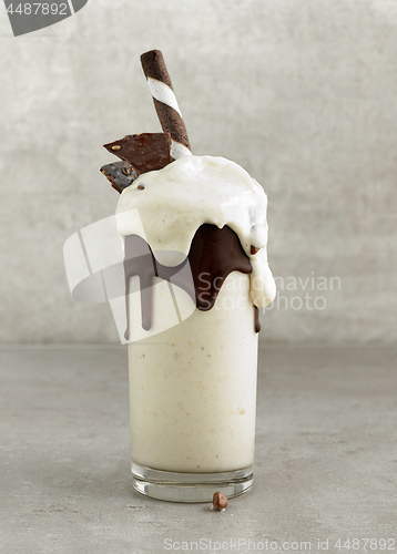 Image of glass of dessert of frozen banana and ice cream
