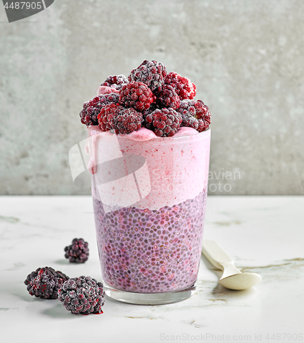 Image of dessert of chia seeds and frozen banana and blackberries