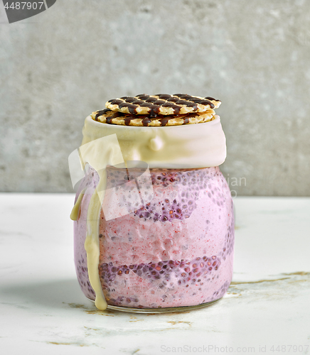 Image of chia pudding with frozen banana and blackberries