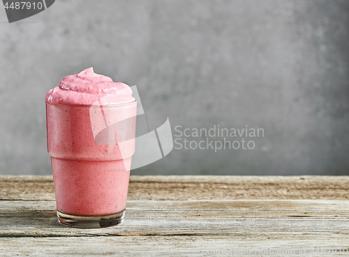 Image of glass of pink milkshake