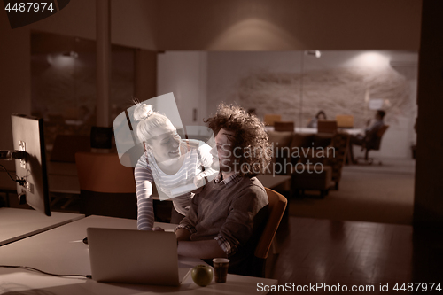 Image of young designers in the night office