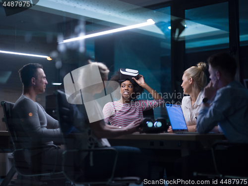 Image of Multiethnic Business team using virtual reality headset