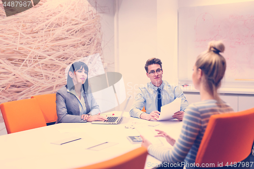 Image of Business Team At A Meeting at modern office building