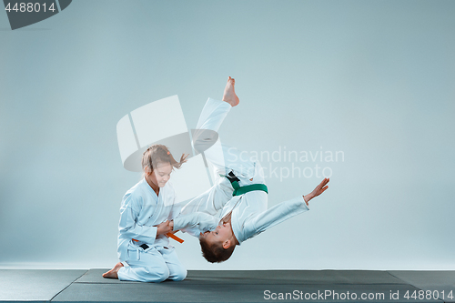 Image of The boy fighting at Aikido training in martial arts school. Healthy lifestyle and sports concept