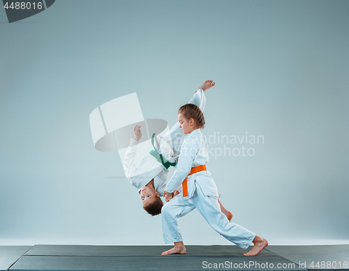 Image of The boy fighting at Aikido training in martial arts school. Healthy lifestyle and sports concept