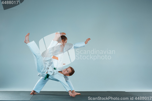 Image of The boy fighting at Aikido training in martial arts school. Healthy lifestyle and sports concept