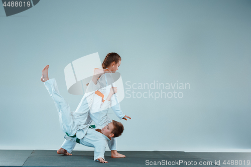 Image of The boy fighting at Aikido training in martial arts school. Healthy lifestyle and sports concept