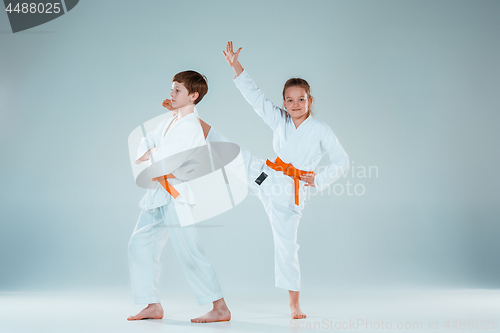 Image of The boy fighting at Aikido training in martial arts school. Healthy lifestyle and sports concept