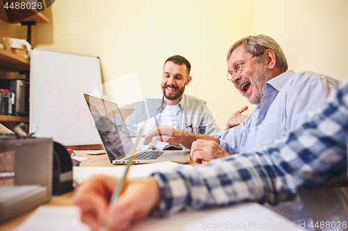 Image of Team job. Photo young businessmans working with new project in office