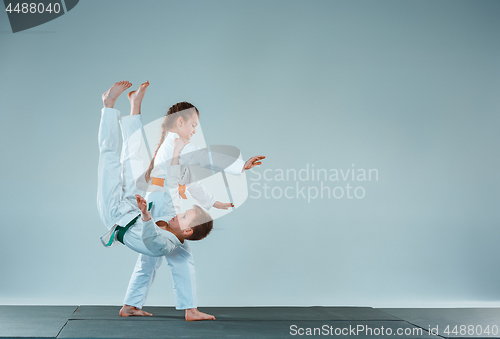 Image of The boy fighting at Aikido training in martial arts school. Healthy lifestyle and sports concept