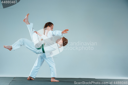 Image of The boy fighting at Aikido training in martial arts school. Healthy lifestyle and sports concept