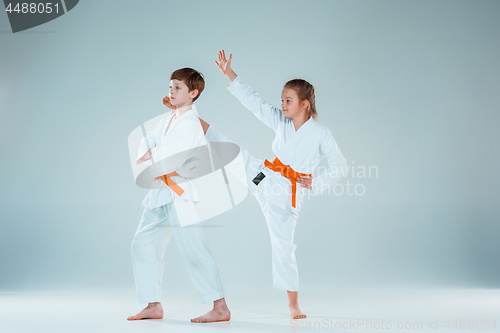 Image of The boy fighting at Aikido training in martial arts school. Healthy lifestyle and sports concept