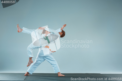 Image of The boy fighting at Aikido training in martial arts school. Healthy lifestyle and sports concept