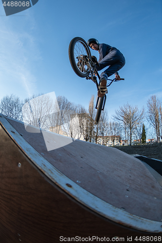 Image of BMX jump in a wooden ramp